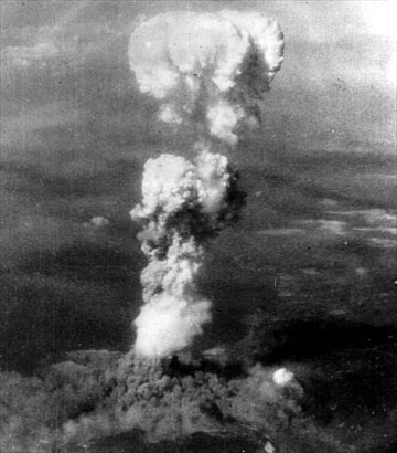 Atomic Bomb Cloud over Hiroshima
The mushroom cloud rising over Hiroshima, Japan. The city of Hiroshima was the target of the world's first atomic bomb attack at 8:16 a.m. on August 6, 1945. The cloud rose to over 60,000 feet in about ten minutes.

About 30 seconds after the explosion, the Enola Gay circled in order to get a better look at what was happening. By that time, although the plane was flying at 30,000 feet, the mushroom cloud had risen above them. The city itself was completely engulfed in a thick black smoke.
