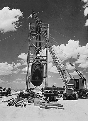 Jumbo
Jumbo weighed 214 tons, was 25 feet long, 12 feet wide, and had walls 14 inches thick. As the reactors at Hanford began to produce greater quantities of plutonium and calculations lessened the chance of a fizzle, Jumbo was abandoned and raised up on a tower 800 feet from Ground Zero to be exposed to the effects from the Trinity Test.
