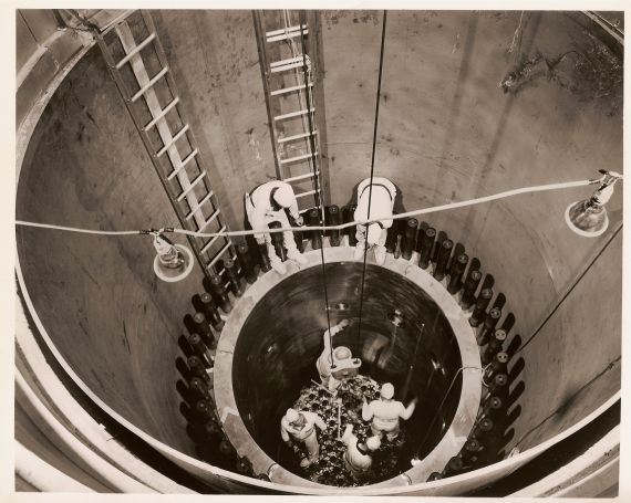 Inside the Reactor
Publicity photo from Consumers Power; accompanying caption reads "(3) Looking down into the reactor, where workmen are preparing it to receive nuclear equipment."
Keywords: big rock point inside reactor construction