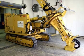 Workers are Trained how to Operate the Silo 3 Excavator.
Workers will remove 5,100 cubic yards of low-level cold metal oxide waste from Silo 3. Waste from the production process was placed in the silo between 1952 and 1957. Workers will use pneumatic and mechanical retrieval systems to remove the waste from the silo and package it in soft-sided containers for off site shipment. The waste will be treated only as required to meet commercially permitted facility's waste acceptance criteria. 
Keywords: Fernald Closure Project Fernald Green Salt Plant, Feed Materials Production Center, Fernald, Ohio (FEMP)