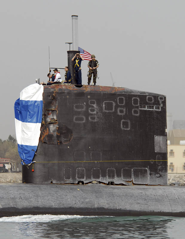 US Navy Ships Collide
This photo released by the U.S. Navy, shows the Los Angeles-class attack submarine USS Hartford pulling into Mina Salman pier Saturday, March 21, 2009 in Bahrain. (AP Photo/U.S. Navy, Cmdr. Jane Campbell)
Keywords: Sub damage collision hartford