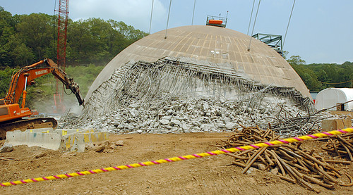 Decommissioning of Connecticut Yankee
THE DECOMMISSIONING OF THE CONNECTICUT YANKEE nuclear power plant in Haddam Neck is now more than 90 percent complete. The reactor containment building and its highly recognizable concrete dome shell is one of the last remaining buildings to be dismantled in the two-year decommissioning project. The dome structure stood 170 feet high, but 30 feet were all that remained on Friday. The dome was weakened from the bottom up using a state-of-the-art reduction method. 

Keywords: DECOMMISSIONING CONNECTICUT_YANKEE Haddam_Neck