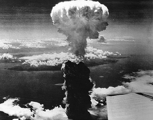 Atomic Bomb Cloud over Nagasaki
On August 9, 1945, the American B-29 bomber, Bock's Car left Tinian carrying Fat Man, a plutonium implosion-type bomb. The primary target was the Kokura Arsenal, but upon reaching the target, they found that it was covered by a heavy ground haze and smoke, pilot Charles Sweeney turned to the secondary target of the Mitsubishi Torpedo Plant at Nagasaki.

Of the 286,00 people living in Nagasaki at the time of the blast, 74,000 were killed and another 75,000 sustained severe injuries.
