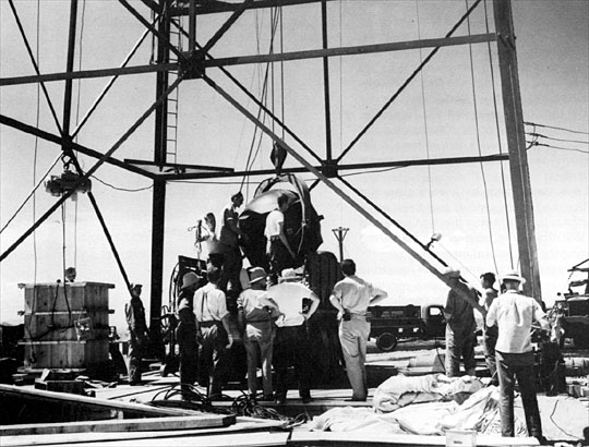 Test Tower
The Gadget at the base of the 100 foot test tower. Assembly began on July 11, 1945 and took five days. 
