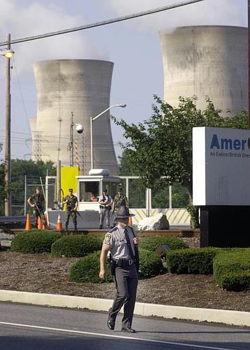 Three Mile Island nuclear power plant
A Pennsylvania State Police officer patrols the front entrance of the Three Mile Island nuclear power plant near Harrisburg, Pa., on July 4, 2002. Police were assisting the Pennsylvania Army National Guard posted at the plant. Security at power plants has been increased since the attacks of Sept. 11, 2001.
Keywords: Three mile Island Nuclear Power Plant (TMI) near Harrisburg Pa in Middletown Penn
