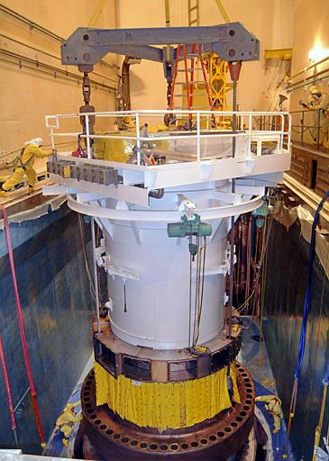 Davis-Besse Nuclear Power Station
Workmen swarm around a new reactor head in the refueling pool at the Davis-Besse Nuclear Power Station near Port Clinton, Ohio, in this December 2002, file photo. The Nuclear Regulatory Commission miscalculated the risk to the public of letting the Davis-Besse nuclear power plant continue to run with suspected reactor leaks, according to a report to be released Tuesday, May 18, 2004.
Keywords: Davis Bessie Nuclear Power Plant