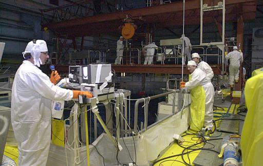 Duane Arnold Nuclear Power Plant
Technical experts conduct an inspection of the nuclear reactor's vessel components on the refueling floor of the Duane Arnold Energy Center near Palo, Iowa, April 7, 2003. The majority owner of Iowa's only nuclear power plant announced Wednesday, Dec. 22, 2004, that it plans to sell its stake in the Duane Arnold Energy Center.
Keywords: Duane Arnold Nuclear Power Plant
