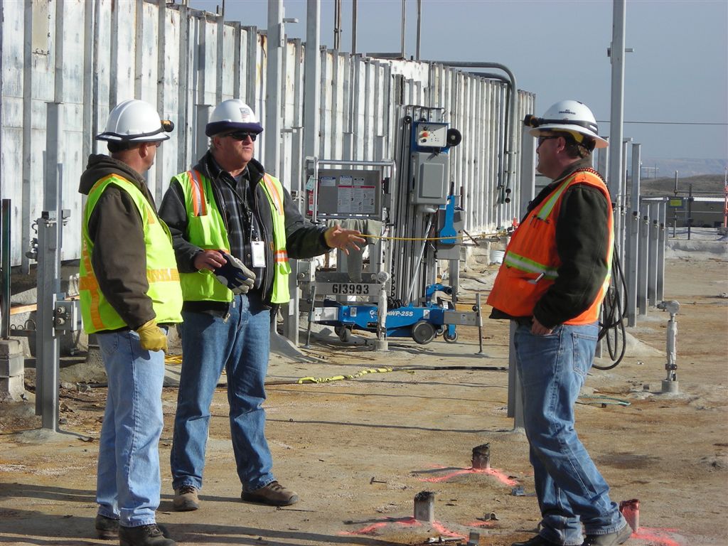 109N rooftop discussion
Bob Lewis (middle) discusses work with John Gessner and Dave
