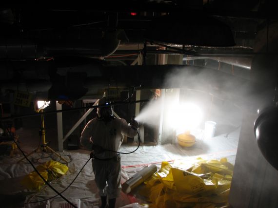 Asbestos Abatement 100N 109N basement
In Oct of 2007, 'Al' was photographed while spraying surfactant to reduce asbestos particles from the air during abatement.
