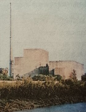 Tarapur faded print of brick buildings and mast